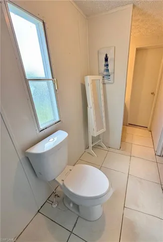 Bathroom with shower and natural light.