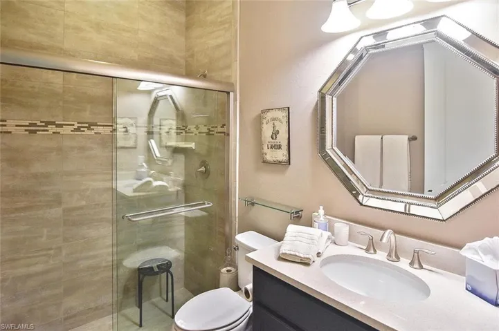 Another Guest Bath featuring walk-in shower
