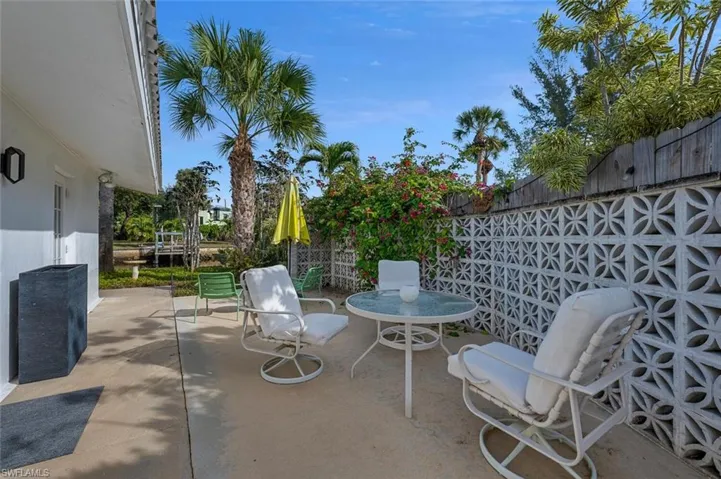 Fenced backyard with a patio area