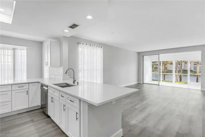 Corner unit, surrounded by windows and light