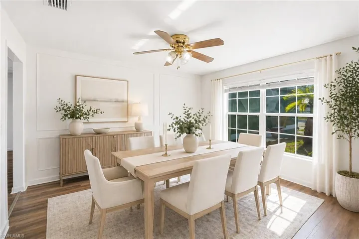 Staged photo of formal Dining space