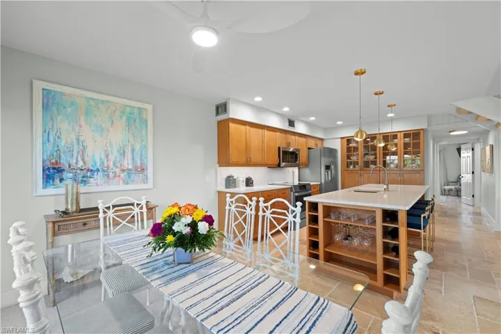 Dining room featuring a ceiling fan and recessed lighting