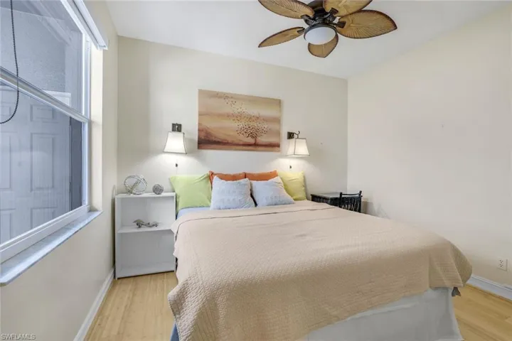 Bedroom featuring ceiling fan and light hardwood / wood-style floors