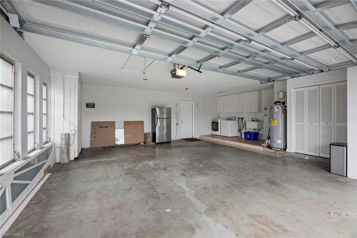 Oversized 2 car garage with 2 storage closets.