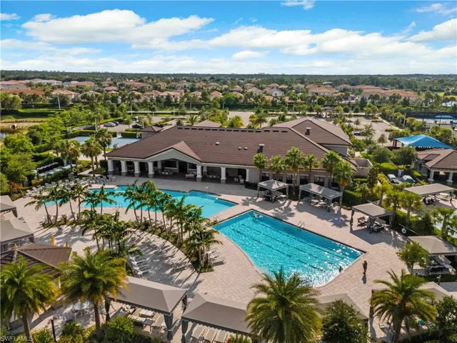 Community pool with a patio area