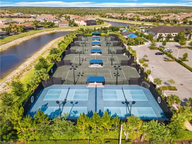 Aerial perspective of suburban area with a large body of water