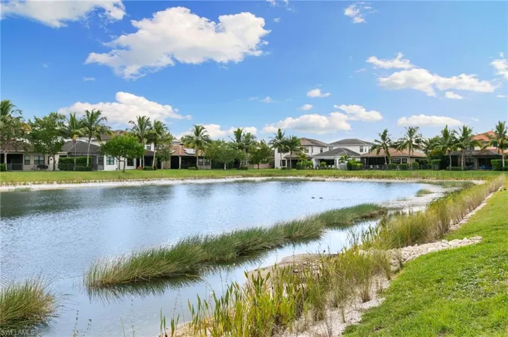 Water view featuring nearby suburban area