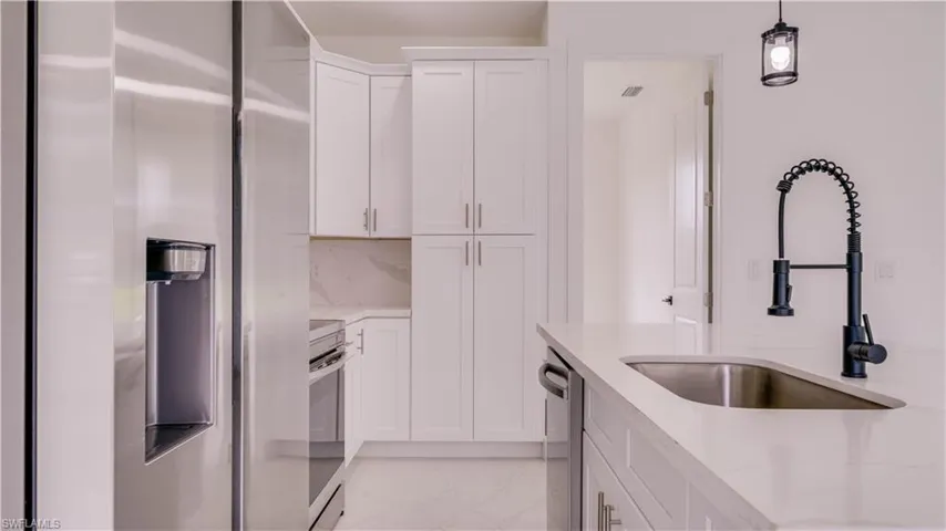 High end Samsung Stainless Steel appliances. Built in Pantry!
