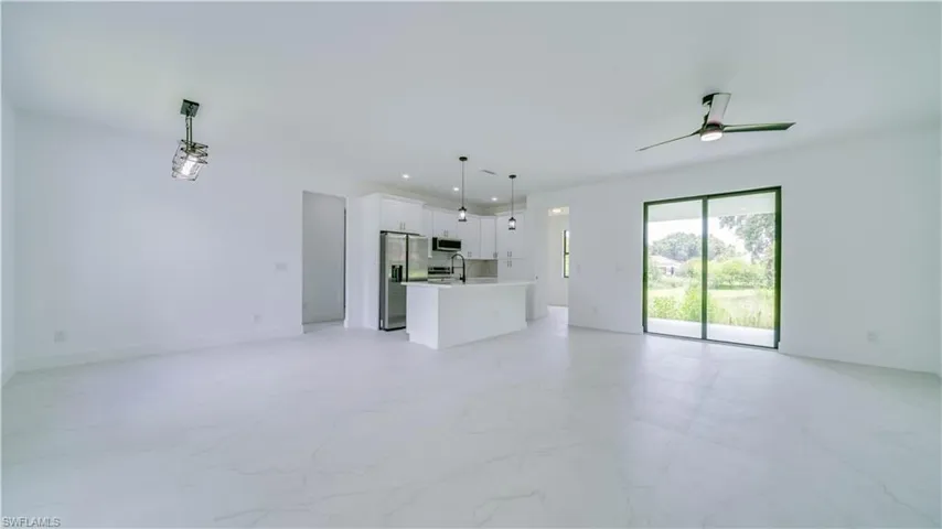 Light & Airy with upgraded light fixtures throughout!