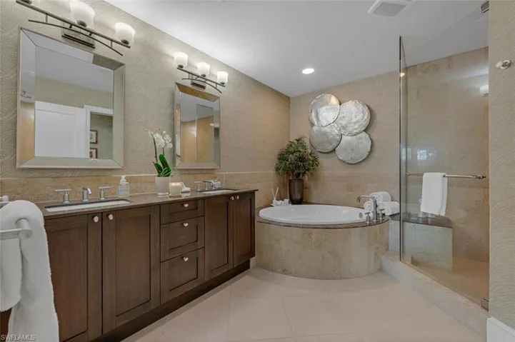 Spacious Master Bathroom with Shower , tub , double sinks