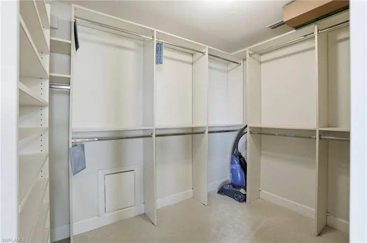 View of walk in closet - Virtually Edited Image