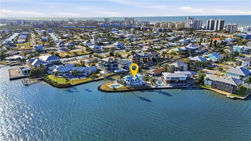 View of urban area with a large body of water and nearby suburban area - Virtually Edited Image