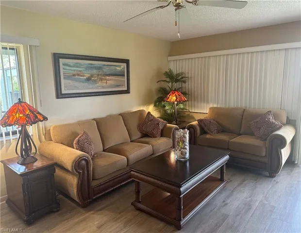 Living room featuring  new flooring