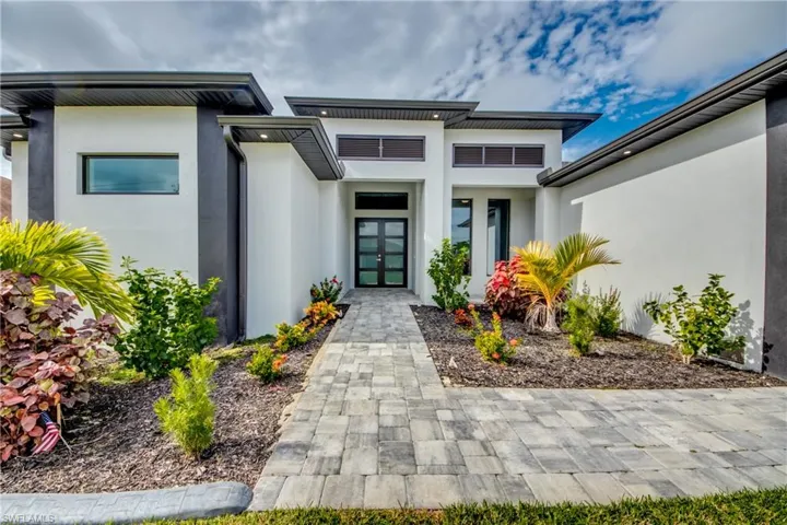 Welcome home to this stunning custom home that is les than one year old!