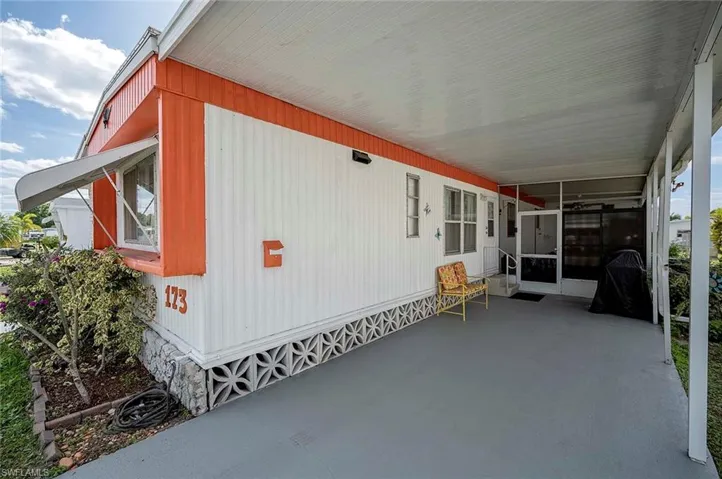 View of patio featuring an attached carport