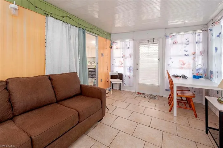 View of tiled living room