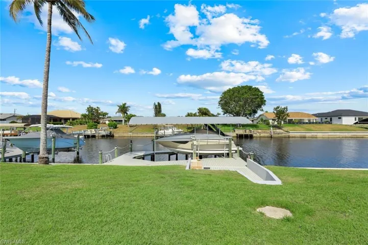 Newer dock with composite decking and a canopy