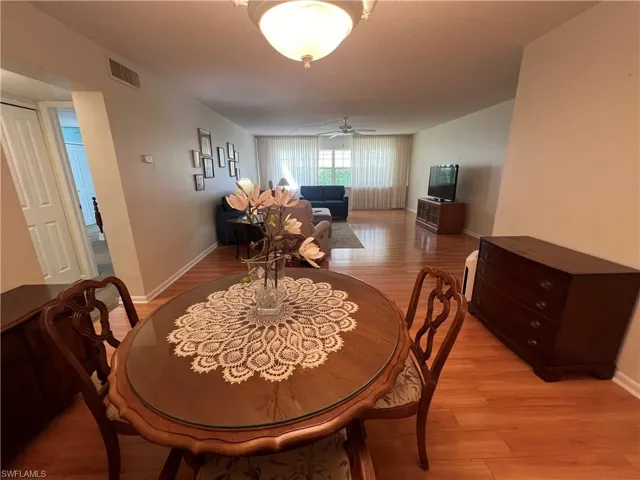 Dining area featuring light hardwood / wood-style flooring and ceiling fan