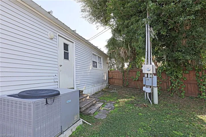 View of fenced backyard