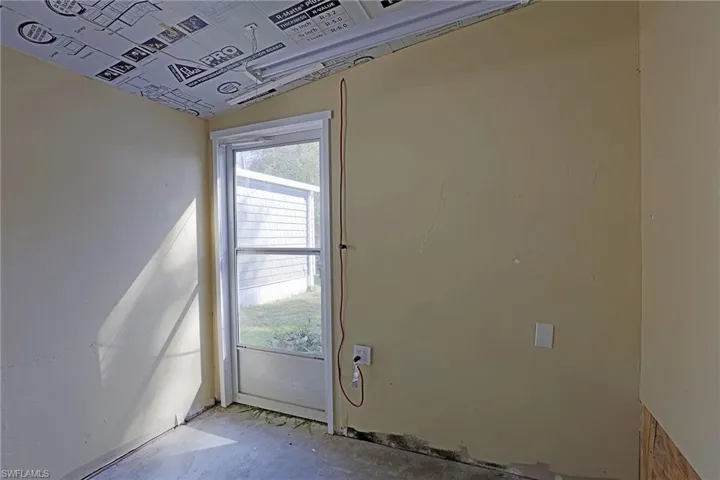 Entryway featuring unfinished concrete floors