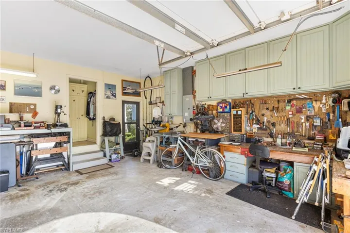 Garage featuring a workshop area