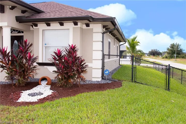 View of home's exterior with a lawn