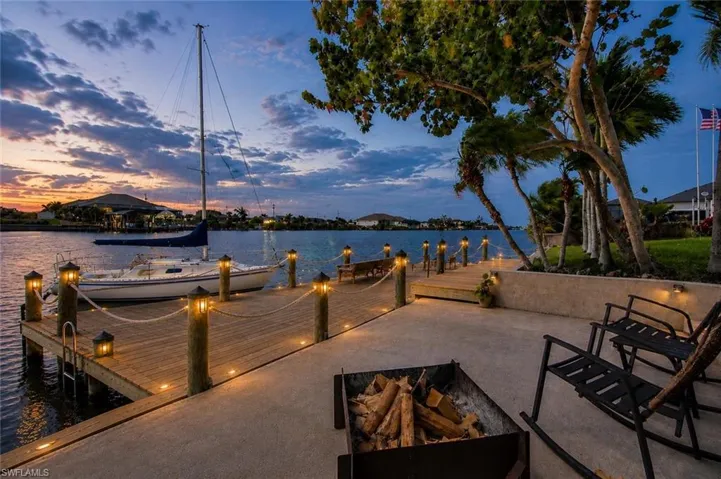 Backyard imagined with pooled and dock area.