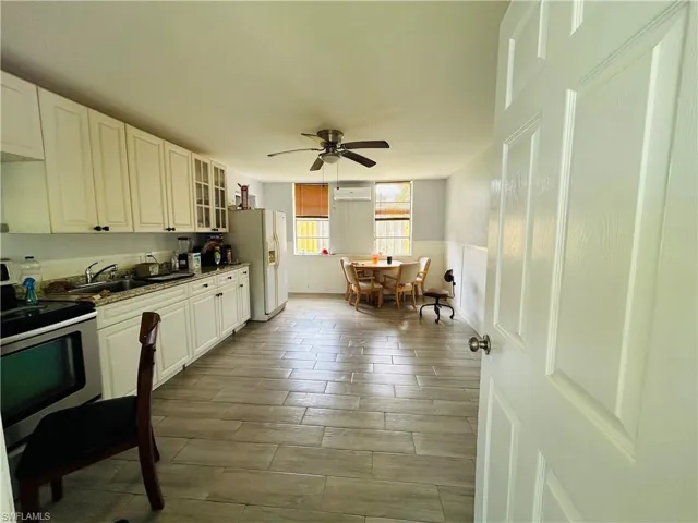 Kitchen/open concept room with ceiling fan