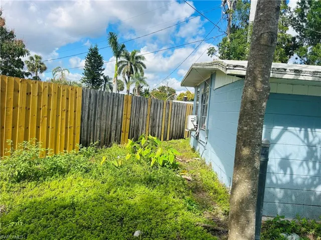 View of rear yard with fence
