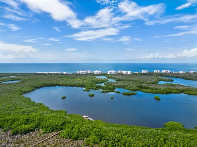 Covered Dock for viewing the sunsets or launching the complimentary paddle boards and kayaks
