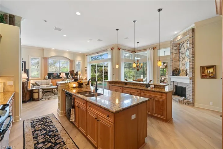 Open and Airy Kitchen looking into the family room and eating area