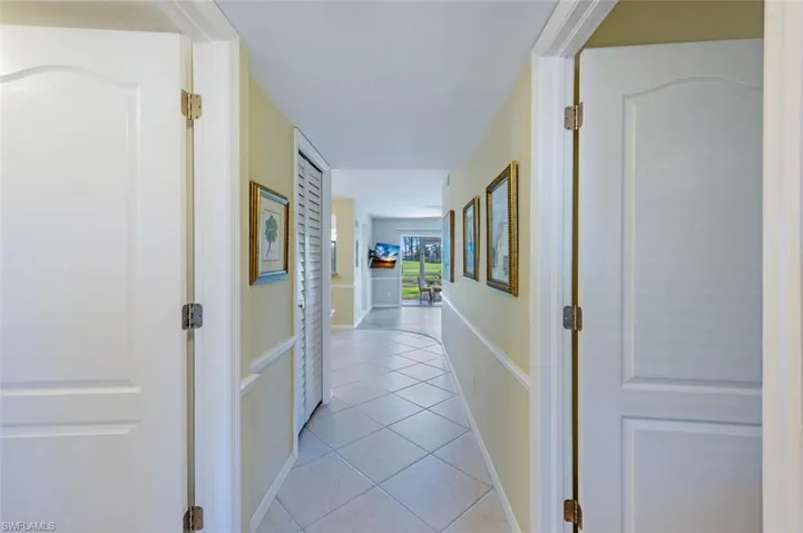 Beautiful spotless tiled entry with Chair Rail