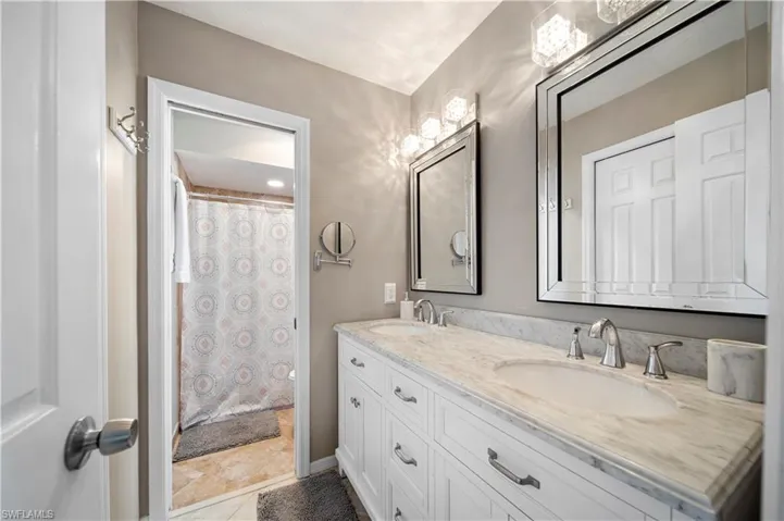 Bathroom featuring vanity and tile patterned flooring
