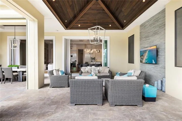 View of patio with an outdoor hangout area