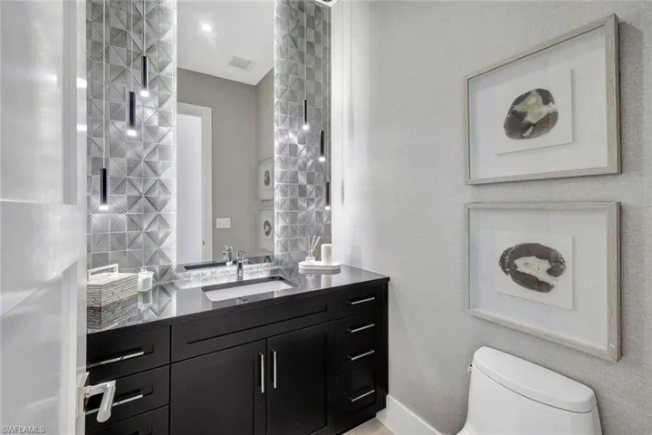 Bathroom with vanity and toilet