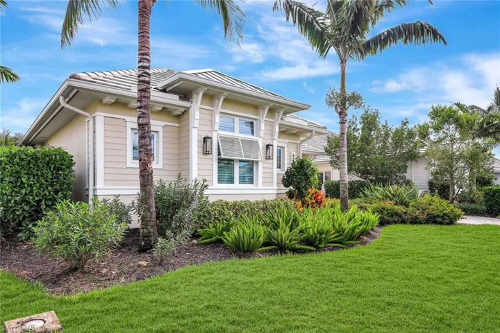 View of front of property with a front lawn