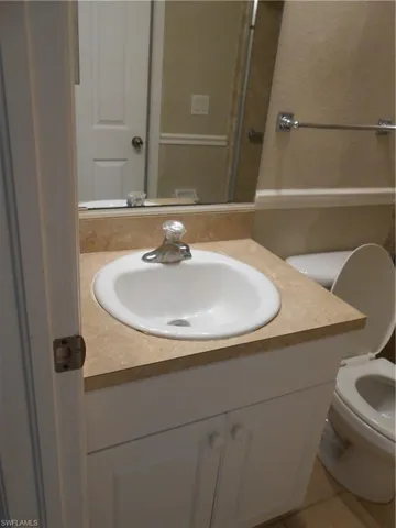 Full bathroom featuring vanity and shower / bath combination