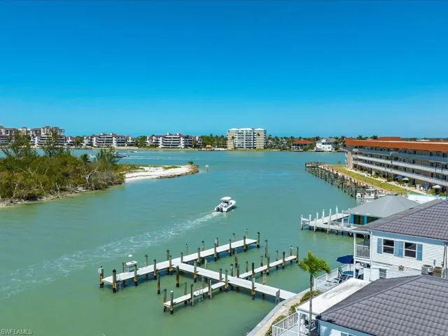 Water view featuring a dock