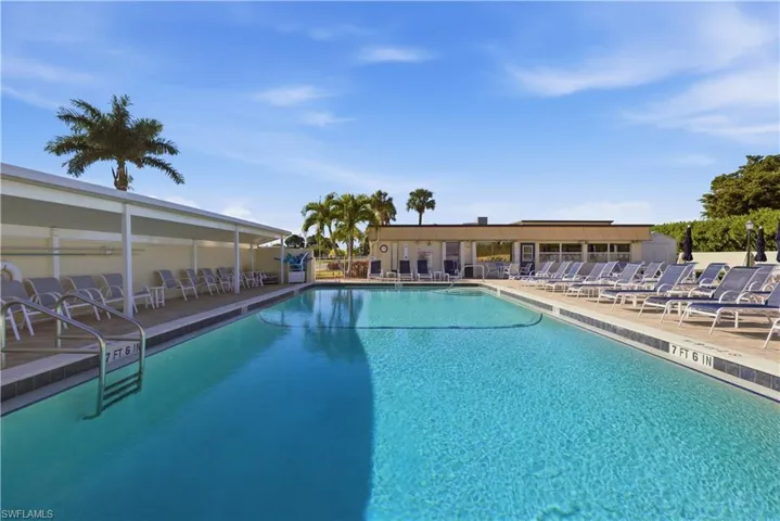 Community pool with a patio area