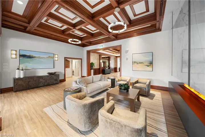 Lobby with coffered ceiling and beamed ceiling