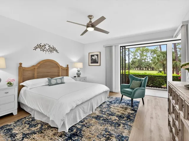 Bedroom featuring light wood finished floors and a ceiling fan