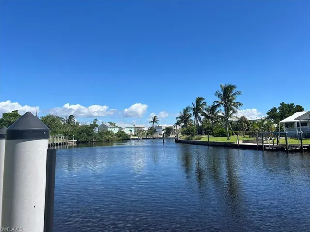 Water view with a boat dock