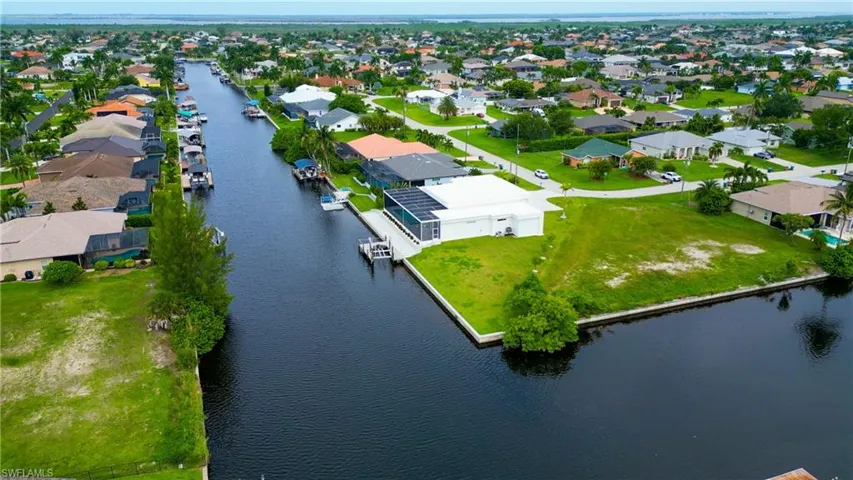 Expansive waterfront parcel with canal frontage