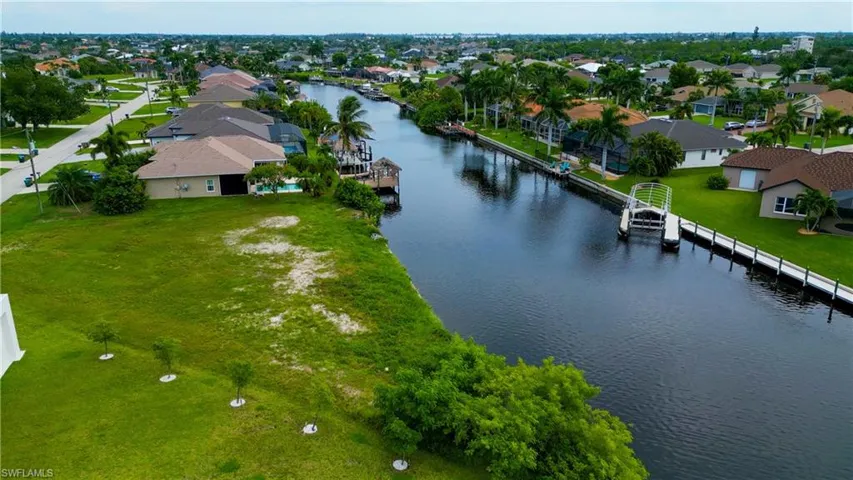 Expansive waterfront lot offering direct canal access