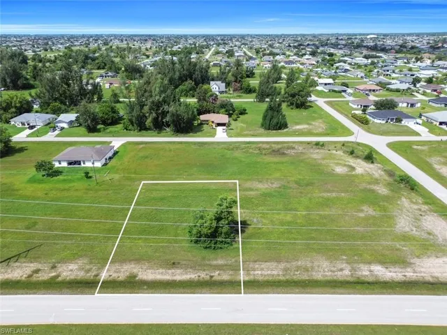 Aerial overview of property's location featuring property boundaries highlighted