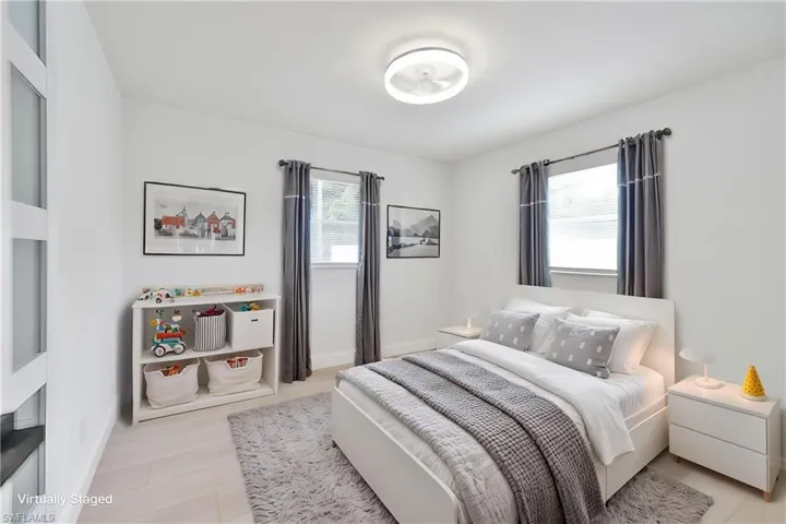 Bedroom featuring baseboards