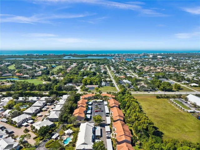 Aerial view of residential area featuring the nearby Gulf of Mexico and Beaches.