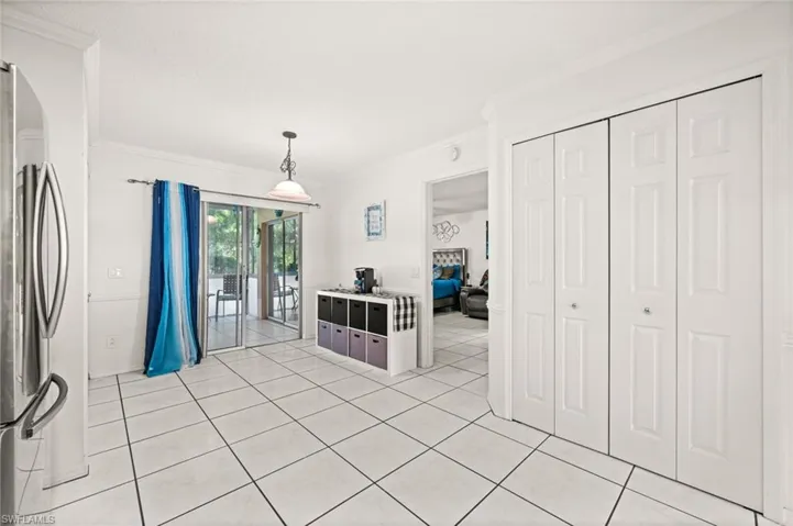 Pantry area leading to the screened lanai and Primary Bedroom.
