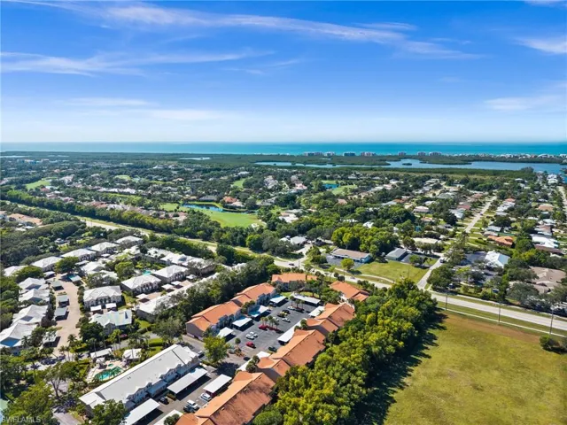 Aerial view of residential area featuring the nearby Gulf of Mexico and Beaches