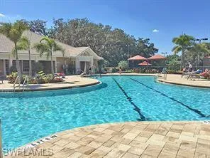 Community pool featuring a patio area